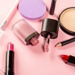 Women’s cosmetics on pink background