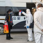 spraying disinfectant